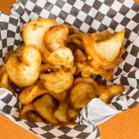 Sidewinders · Lightly battered & seasoned, thick-cut curly fries