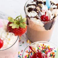 Real Ice Cream Shake · Thick ice cream shakes with your choice of flavor.
Vanilla
Chocolate 
Strawberry 
Cookies an...