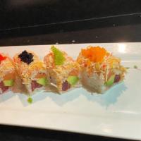 Christmas Roll · Tuna, salmon, avocado inside, spicy crab on the top, with different tobiko on the top