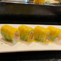 Mon Soon Roll  · Spicy salmon crunchy inside, outside avocado and mango top with mango sauce
