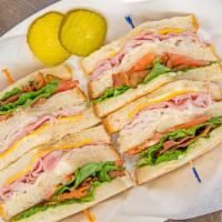 Sub Combination Sandwich · Turkey, ham, bacon, lettuce, tomato, cheese & mayo on sub