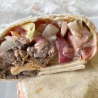 Chicken Shawarma Wrap · Regular Toppings - - - Served with Lettuce, Tomatoes, Pickles, Garlic, and Tahini. You can c...