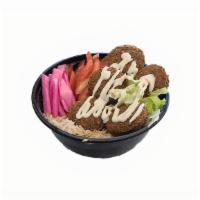 Falafel Bowl · Regular Toppings - - - Served with 5 pieces of Falafel, Rice, Lettuce, Tomatoes, Onions, Hum...