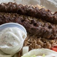Lamb & Beef Kabob Bowl With Rice · Served with 2 kabob skewers over rice, lettuce, tomato, onions and a piece of bread.