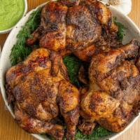 Rotisserie Coal Fired Chicken (Halal)  · This is Halal Peruvian at it's finest. Half chicken, coal fired rotisserie (pollo a la brass...