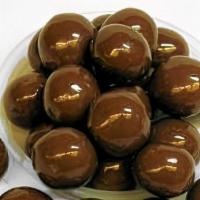 Malted Milk Balls, Milk Chocolate · A crisp malted center drenched in a layer of chocolate. 

Milk chocolate, sugar, chocolate l...