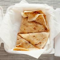 Cheese Quesadillas · Chicken or beef served over a bed of greens with cheese beans and onions with spicy ranch on...