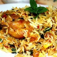 Chennai Veg Biriyani · Spicy flavored rice cooked with fresh veg and special southern spices. Served with raitha an...