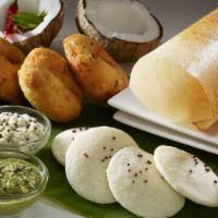 Idli · Rice and lentils cooked in special pot. Serve with assorted chutneys and sambar.