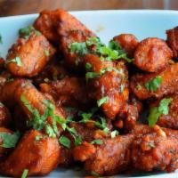 Kodi Vepudu · Tender pieces of boneless chicken cooked dry in a spicy masala.