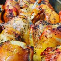 Pollo Al Horno / Baked Chicken · Comes with white rice and beans.