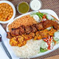 Lamb & Chicken Kabob Platter · Includes basmati rice (white and brown), salad, fresh tandoori bread, side of chick peas, on...
