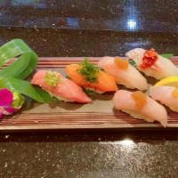 Sushi Omakase · Chef's best selection of daily 8 pcs nigiri sushi  .