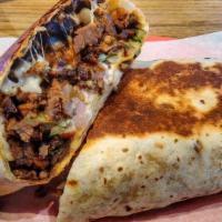 Skirt Steak Burrito · Lettuce, rice, beans, cheese, sour cream, and pico de gallo