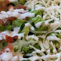 Adobo Chicken Bowl · Lettuce, rice, beans, cheese, sour cream, and pico de gallo.