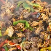 Mix Fjitas (Chicken And Beef) · 1 pound of Adobo Chicken and 1 Pound  of Skirt Steak mixed with onions, green and red pepper...