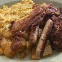 Monster Meal · Two eggs, two sausage links, two pieces of bacon, side of ham, two orders of toast, home fri...