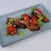 Tamarind Glazed Wings · (gs) peanuts, fresno chiles, cilantro, scallions **CONTAINS NUTS