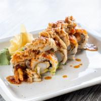Ravens Roll · Shrimp Tempura and Avocado rolled, topped with Super Lump spicy Crabmeat, Tobiko and Old Bay...