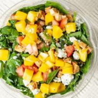 Kale Harvest Mango Salad · Kale, Chicken, spinach, fresh mango, tomatoes, crumbled Blue Cheese, walnuts, and ranch dres...