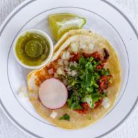 Tacos Al Pastor  · Carde de puerco con cilindro y cebolla picada y rábano