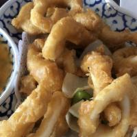 Salt & Pepper Calamari · Fried calamari with bell peppers, onions with sweet and sour sauce.