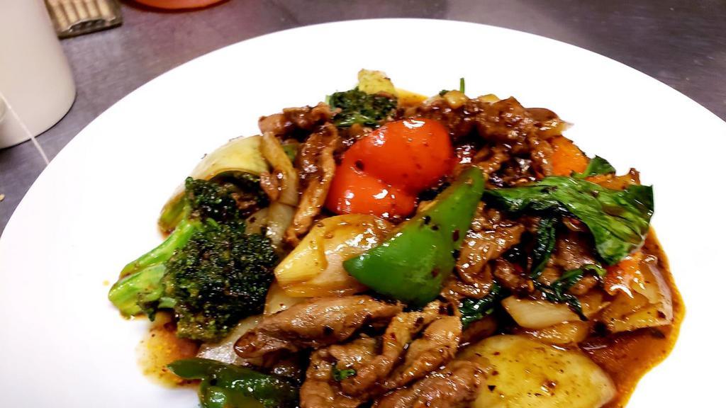 Spicy Basil · Stir fried onions, bell peppers, broccoli, green beans and fresh basil.