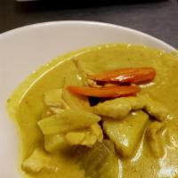 Yellow Curry · Coconut milk with yellow curry paste, onions, potatoes and carrots.