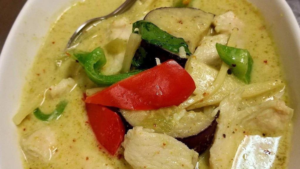 Green Curry · Coconut milk with green curry paste, bell peppers, bamboo shoots, eggplants and fresh basil.