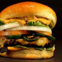 Tex Mex Burger · 1/3 Lb. Patty, Mixed Greens, Roma Tomato, Shaved Onions, Avocado, Grilled Jalapeño, Pepper J...