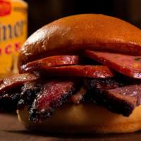 Big Urban Sandwich · Moist cut Brisket and Jalapeno Cheddar sausage link.