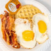 Waffles, Eggs (2), Bacon, Ham Or Sausage · Includes coffee or crange juice.