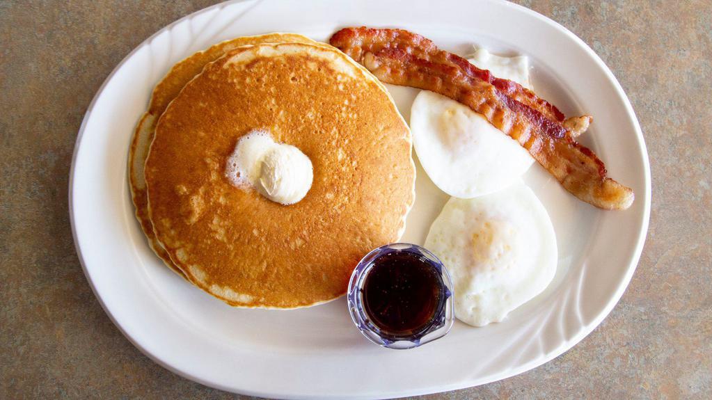 Hot Cake Combo · Two pancakes, two eggs and your choice of two strips of bacon, two sausage links or one sausage patty served with whipped butter and maple syrup.