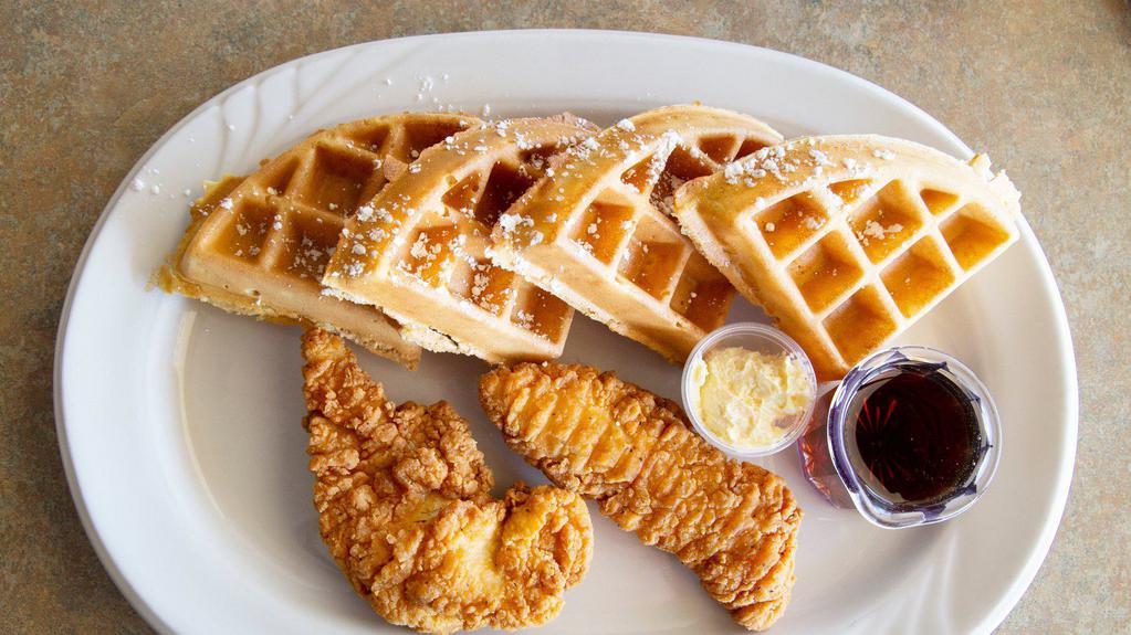 Chicken & Waffles · One whole malted waffle with two breaded chicken tenderloins topped with powdered sugar