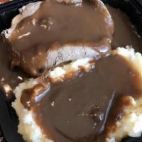 Hot Roast Beef Sandwich · Open Faced - Served open face with plenty of tender lean beef and homemade beef gravy.