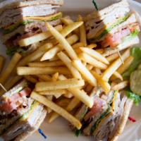 Triple Decker Club Sandwich · Toasted white, turkey, bacon, cheddar, lettuce, tomato, mayo