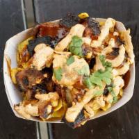 Player'S Pie · Frito-pie with your choice of meat. Topped with BBQ sauce, onions, cilantro and chipotle cre...