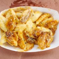 Smoked Mac & Cheese · Creamy four-cheese macaroni shells seasoned and smoked on the pit. Serve with meat with addi...