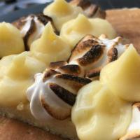 Lemon Meringue · Lemon curd, lemon madeleine cake, pie crust and torched Italian meringue.