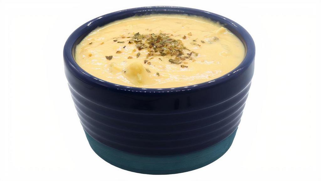 Broccoli Cheddar Soup · A classically inspired favorite featuring chopped broccoli, creamy cheddar, and select seasonings.