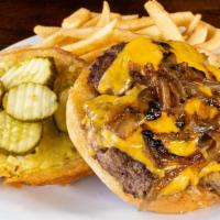 Smashburger · Lean beef burger patty, onion, American cheese, bread & butter pickles and union sauce!