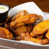 Union Traditional Wings · Jumbo wings tossed in a house made sauce of your choosing! (BBQ, Maple BBQ, Buffalo, and Spr...