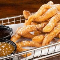 Funnel Cake Fries  · Shareable sized order of funnel cake fries topped with cinnamon sugar and powdered sugar! Th...