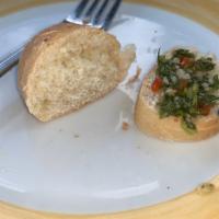 Provoleta On A Garlic Toast · Grilled provolone cheese, fresh tomatoes, oregano.