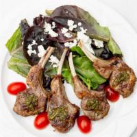 Lollipop Lamb Chops · Served with mint salsa Verde and watercress salad.