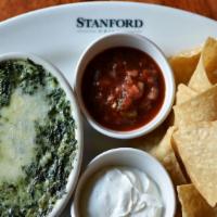 Spinach &  Artichoke Dip · Fresh spinach, artichoke hearts, and onions, blended with Monterey Jack tossed in a Parmesan...