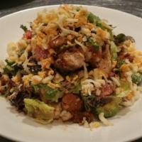 Club Salad · Crispy chicken, mixed greens, tomato, avocado, smokehouse bacon, monterey-jack, and cheddar ...