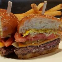 The Stanford Cheeseburger · Hardwood grilled Angus beef topped with monterey-jack and cheddar cheese, lettuce, tomato, o...