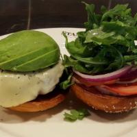 California Burger · Hardwood grilled Angus beef topped with dill Havarti, 1000 island dressing, avocado, dressed...