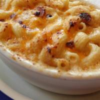 Bacon Mac & Cheese · Diced onion, applewood bacon, and cayenne pepper, tossed with sharp white cheddar cheese, cr...